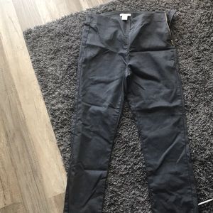 Gray pants with gold zipper on side